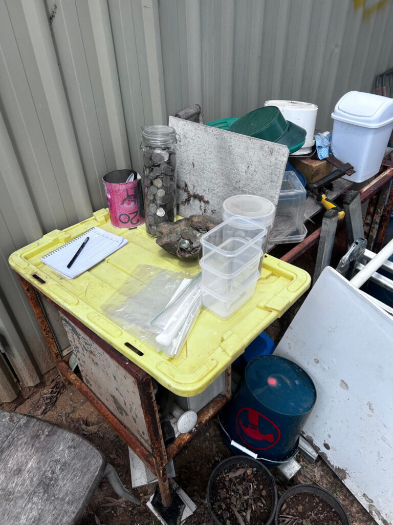 Australian coins ready for sorting by denomination at the improvised workstation